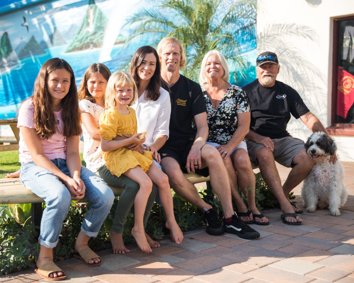 Stewart/Leines family in front of the Stewart Surf Shop