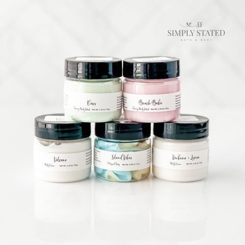 Simply Stated Bath and Body travel size sample size jars of body lotion, sugar scrub, and whipped soap