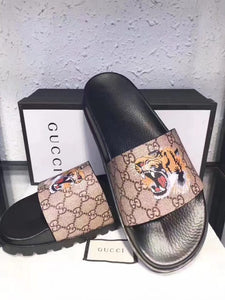 gucci slides with lion
