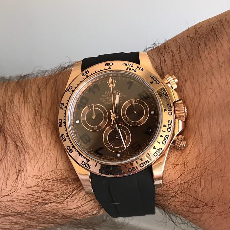 rolex daytona gold with rubber strap