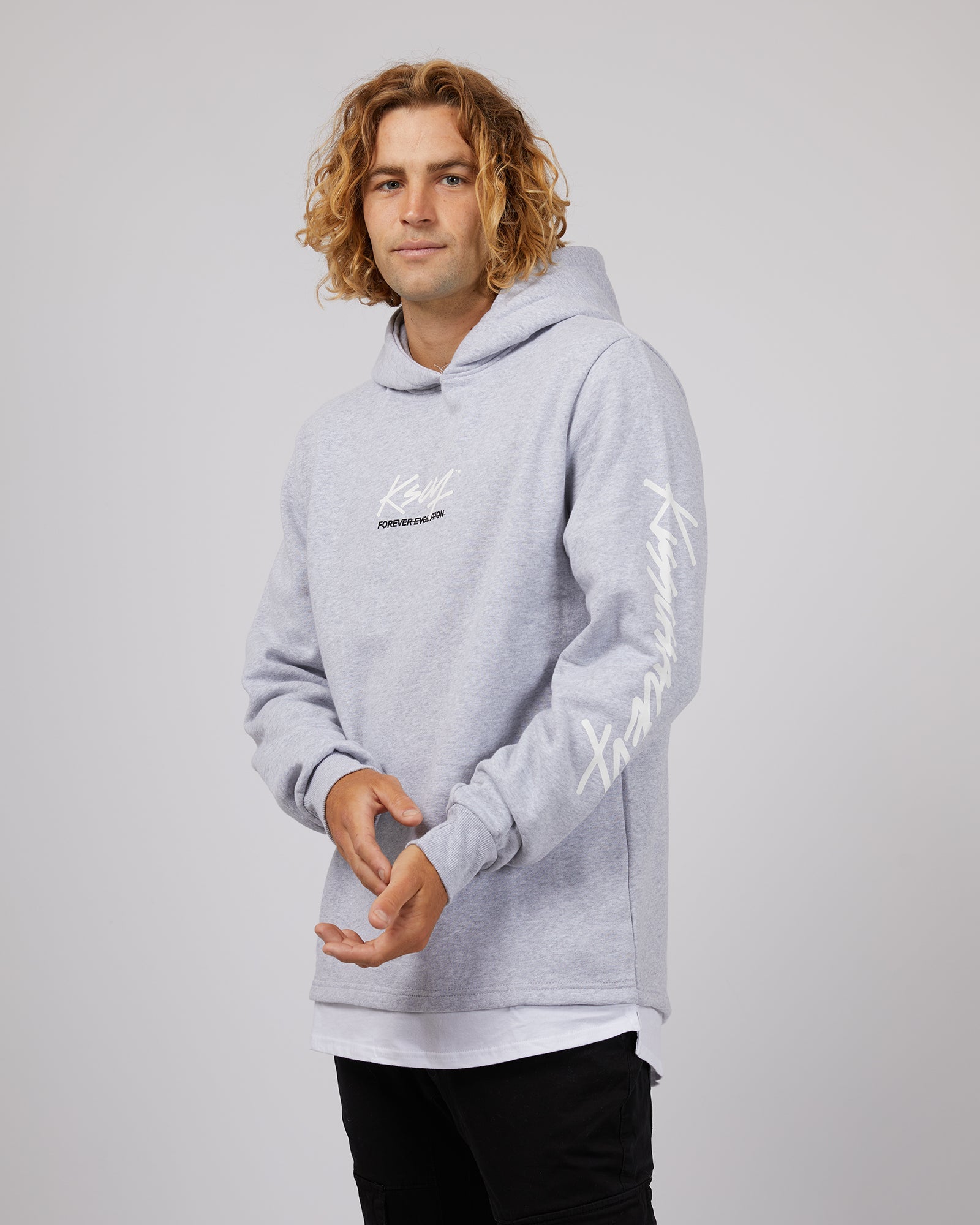 https://cdn.shopify.com/s/files/1/2153/3679/files/Kiss-Chacey-Trevor-Hooded-Layered-Sweater-Grey-Marle-Edge-Clothing-4_1600x.jpg?v=1709043704