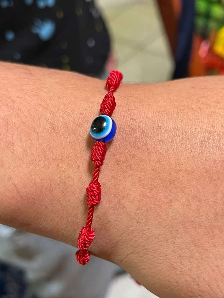 red bracelet evil eye