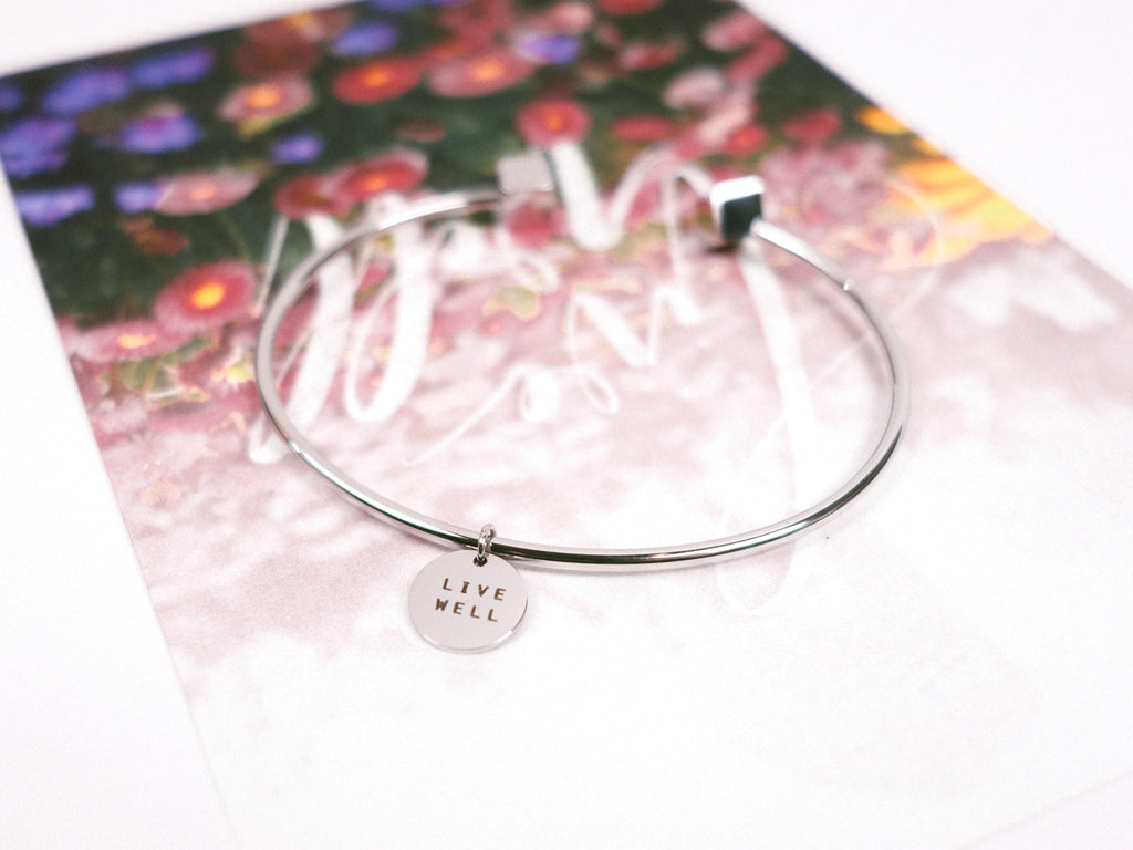 Live Well Round Pendant Bracelet in Silver 