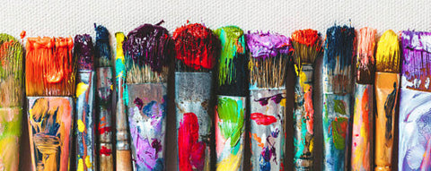 Artist brushes covered with paint to symbolise all the beautiful original paintings we have for sale by the artists we represent here at The Acorn Gallery in Pocklington. All paintings and prints are available online or in store with delivery available if required.