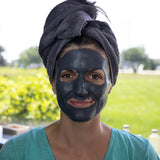 Charcoal Clay Mask Applied to Face