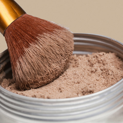 The best way to apply natural powder dry shampoo is with an applicator brush.