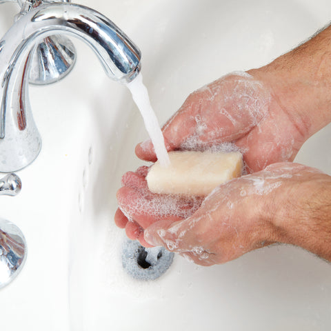 Washing Hands with Natural Soap