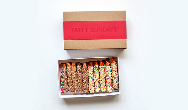 Gift box of twenty chocolate covered pretzels with assorted flavors