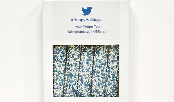 Kraft box of five pretzels with blue and white sprinkles and Twitter logo