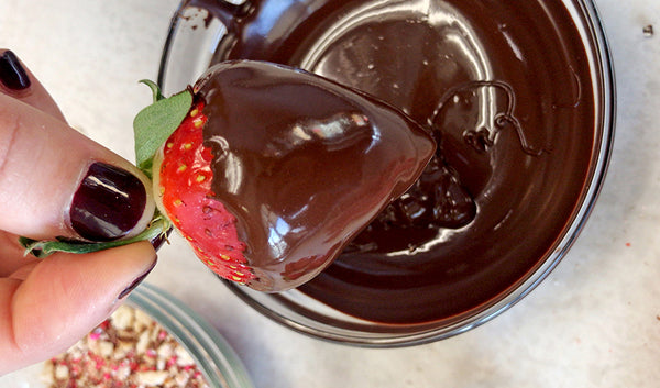 Strawberry dipped in melted dark chocolate