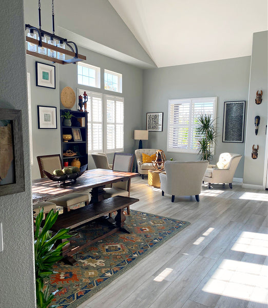 large airy living dining room with african accent decor