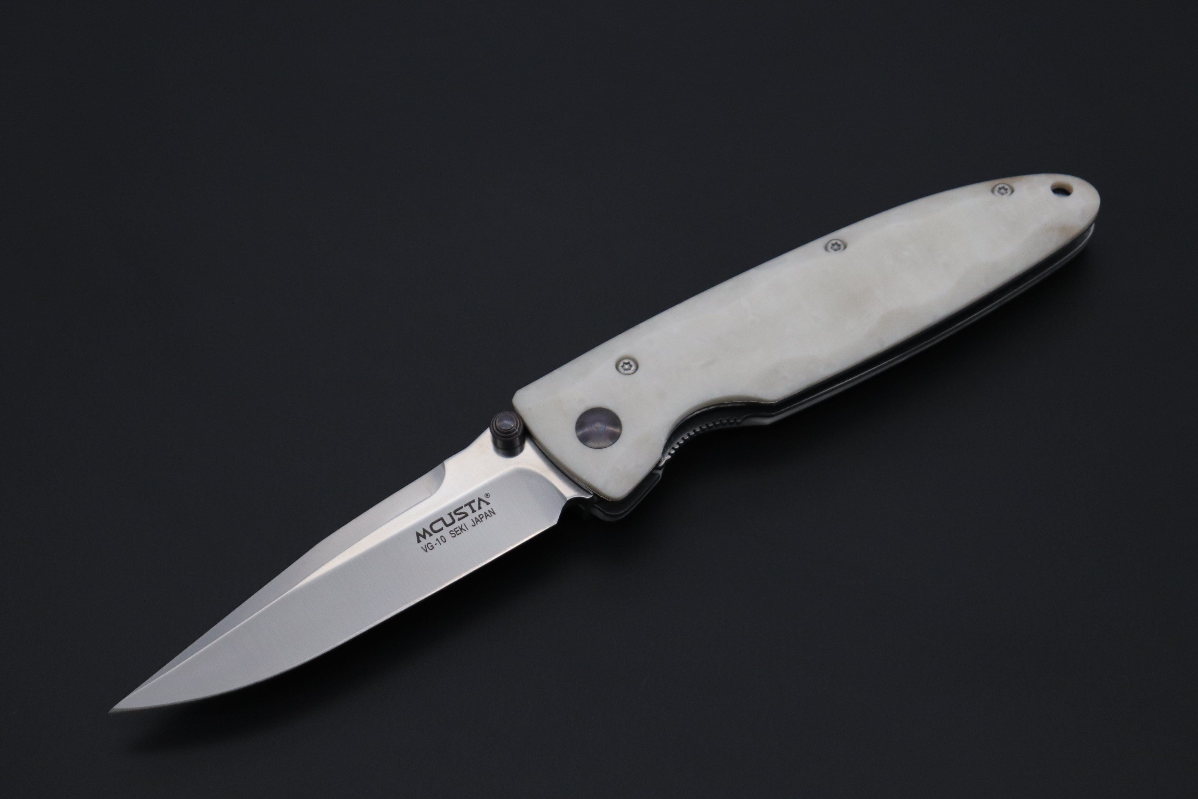 Mcusta Classic Wave Series MC-19V VG-10 blade with Dupont Corian handle