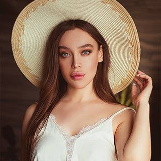 Beautiful girl is wearing a hat