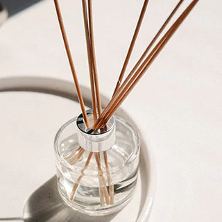 A reed diffuser in a room