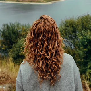 Woman is enjoying the view of lake