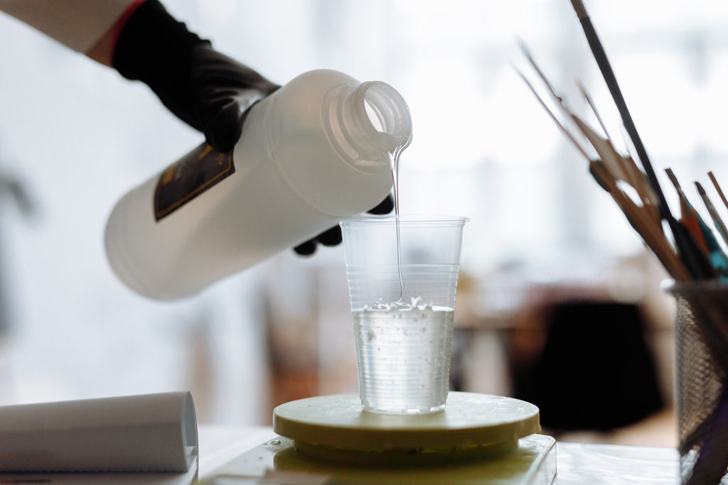 resin pouring out of bottle 