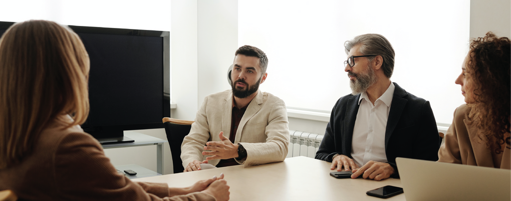 Man Asking Question in Meeting