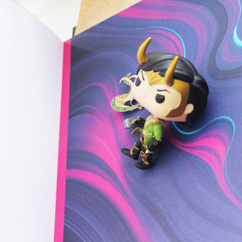 Loki funko pop on colorful background paper for instagram