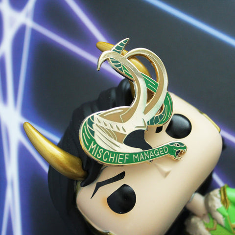 gold Loki helmet enamel pin