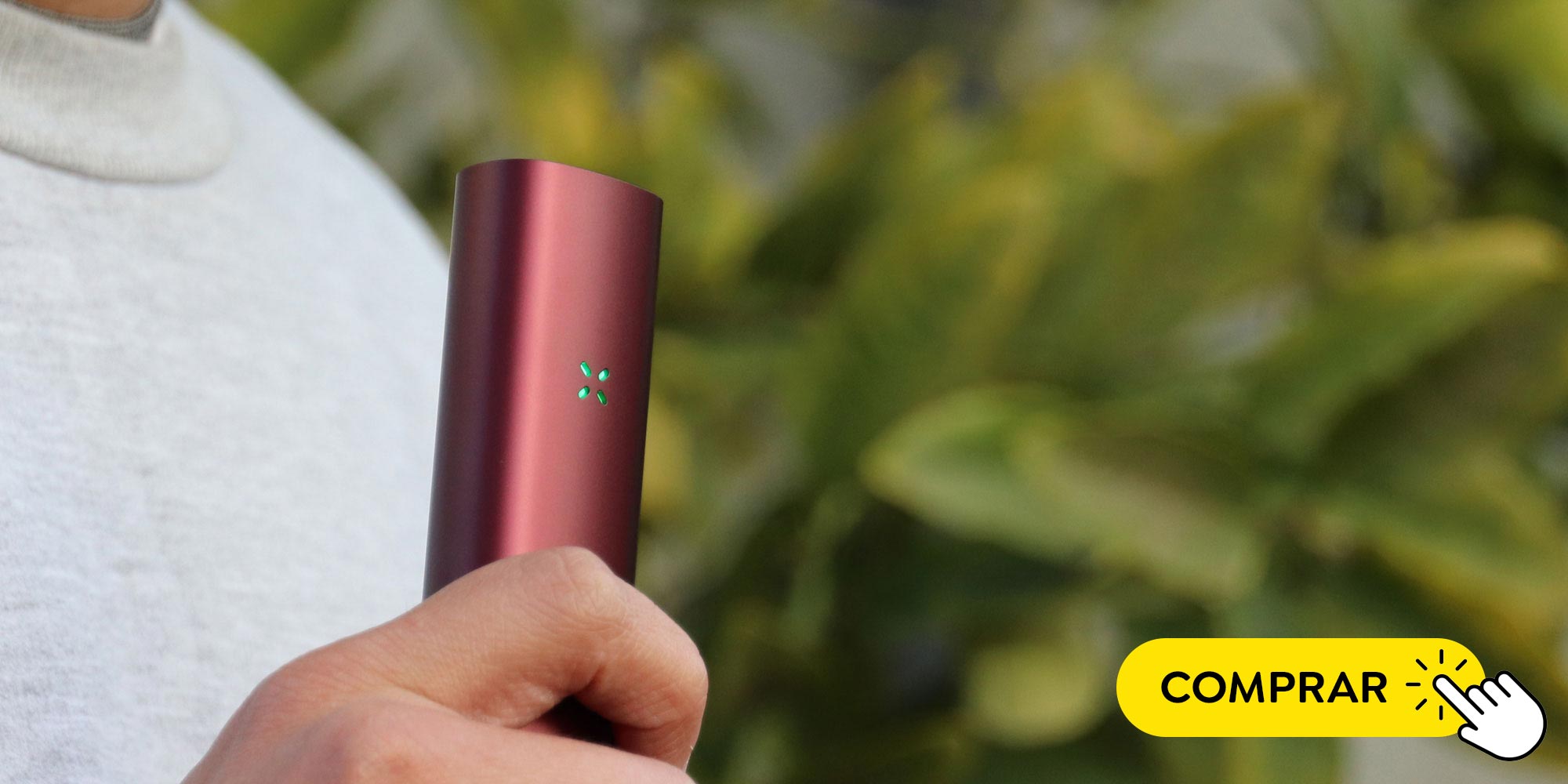 mano sosteniendo Vaporizador rojo pax 3 