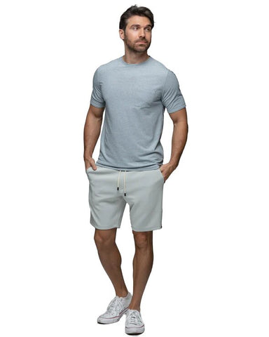 Man in a grey cotton t-shirt and shorts