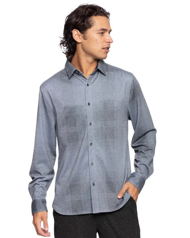 Man wearing a grey checkered long-sleeve shirt