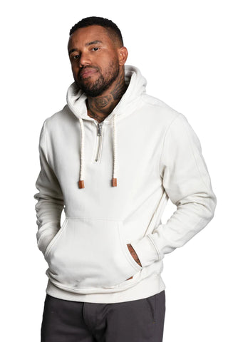 model wearing a white hoodie