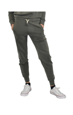 A woman in olive green joggers