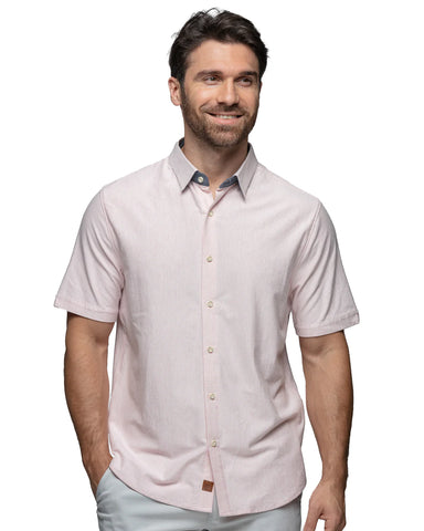 Man wearing a powder pink short-sleeve shirt