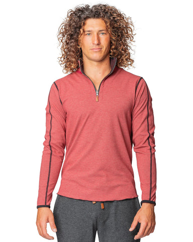 Man wearing a red quarter-zip sweatshirt