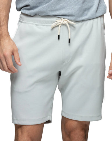 Man wearing white fleece shorts