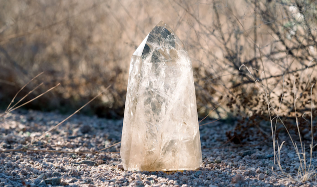 Natural citrine tower with a desert background