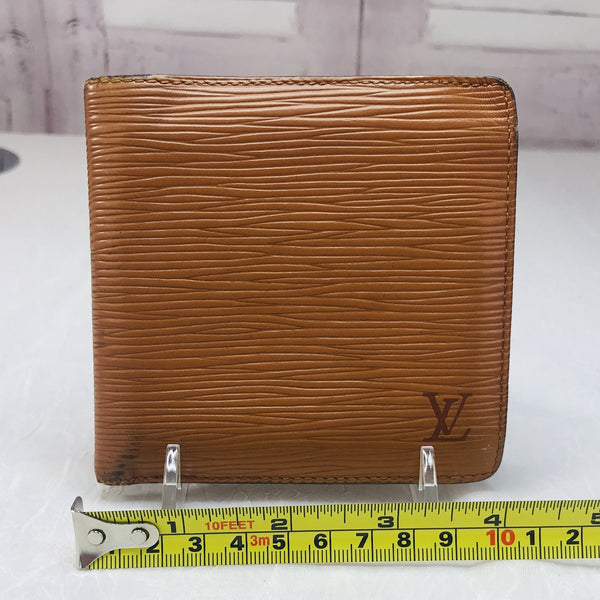 Leather wallet Louis Vuitton Brown in Leather - 34281663