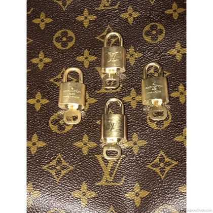 Louis Vuitton Speedy Lock and Keys set (New Condition) - Dust Bag NOT  included