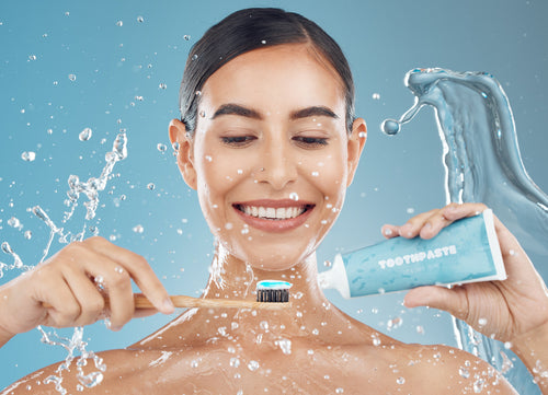 woman-brushing-teeth-and-with-smile-happy-and-wa-2023-11-27-05-17-22-utc.jpg__PID:a1985a6d-071b-4312-92df-7b0f1340f6fb