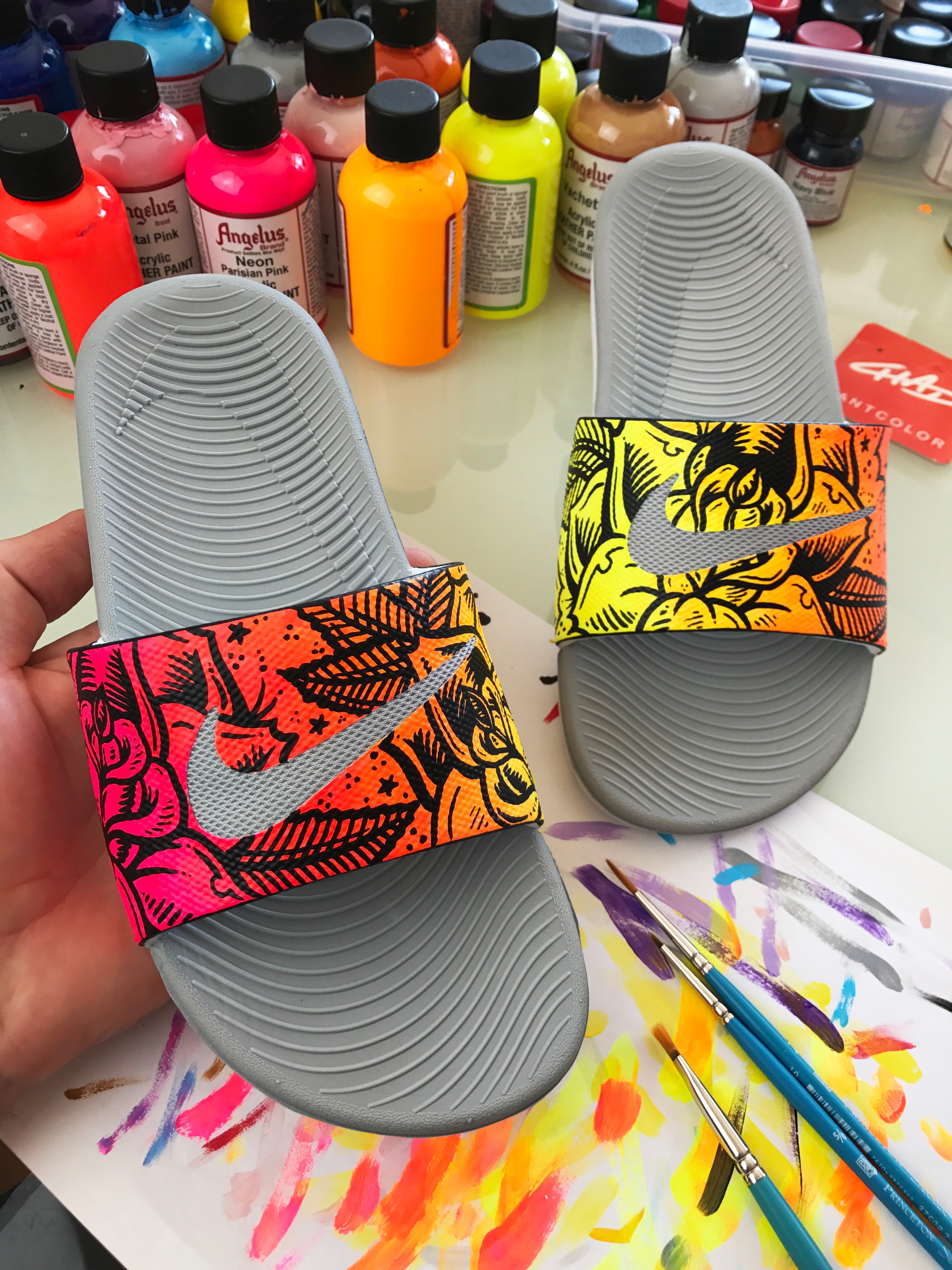 neon orange nike slides