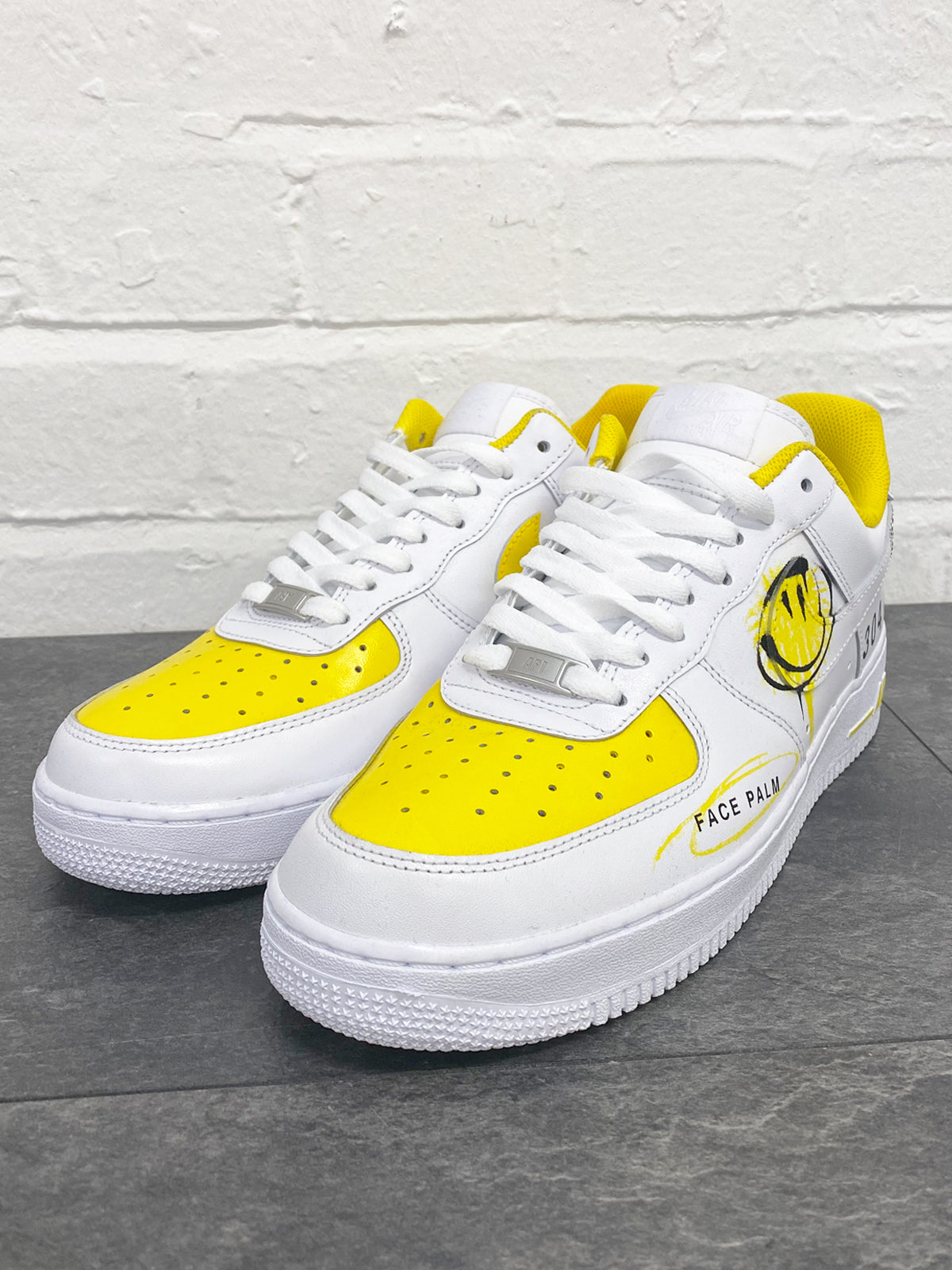 nike smiley face trainers