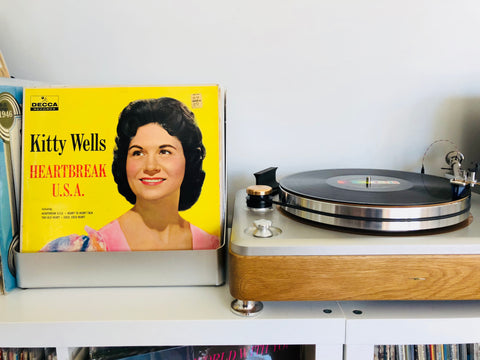 kitty wells flipbin vinyl record display with shinola turntable