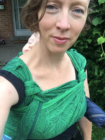 didymos didyklick half buckle carrier with a fancy finish back carry