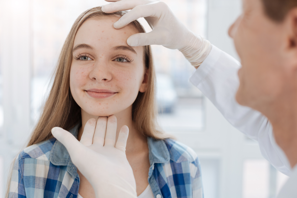 woman at the dermatologist office