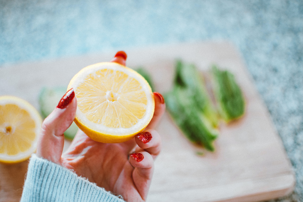 holding a lemon