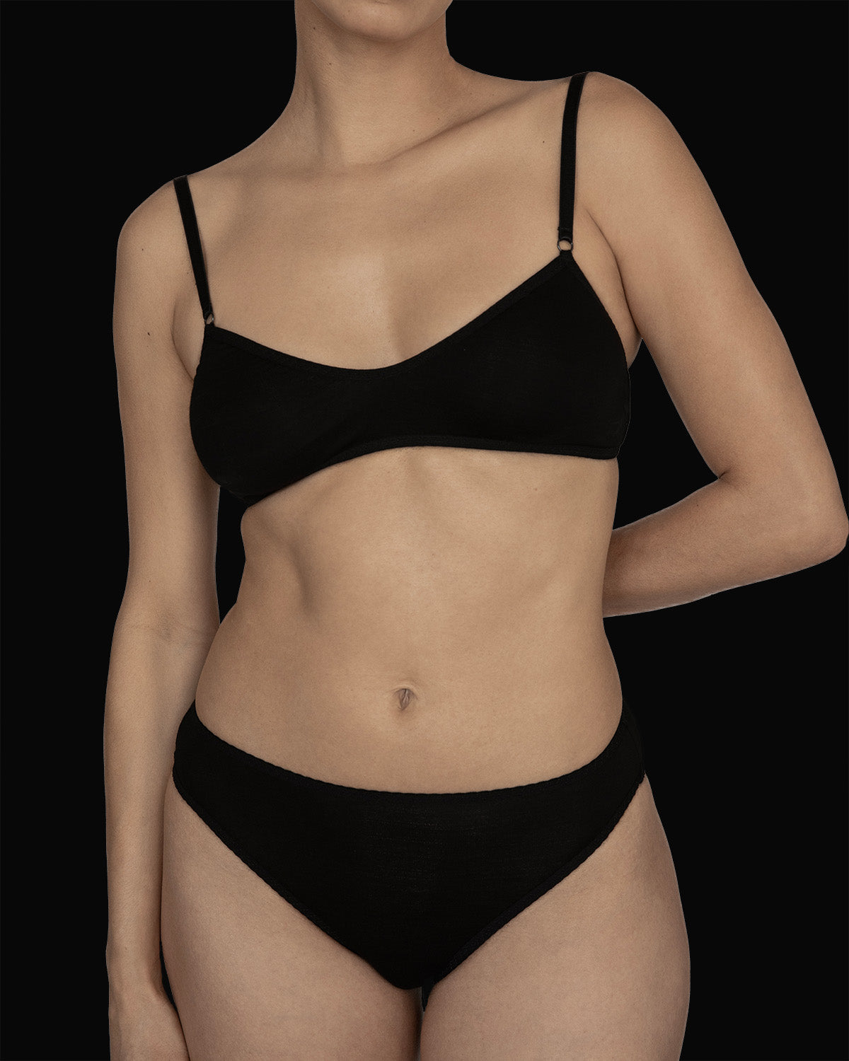 The Kye Intimates Recline Bra in the color Black. A gentle, pullover scoop neck bra, with adjustable shoulder straps. A double layered bamboo bra that is designed to provide maximum comfort.