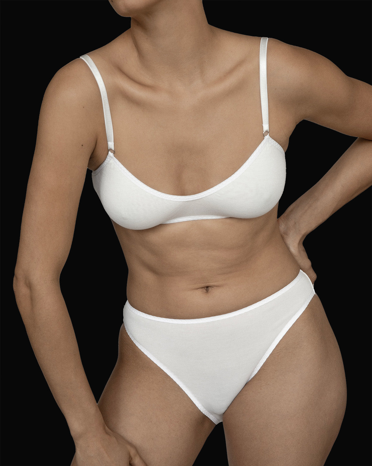The Kye Intimates Recline Bra in the color Natural. A gentle, pullover scoop neck bra, with adjustable shoulder straps. A double layered bamboo bra that is designed to provide maximum comfort.