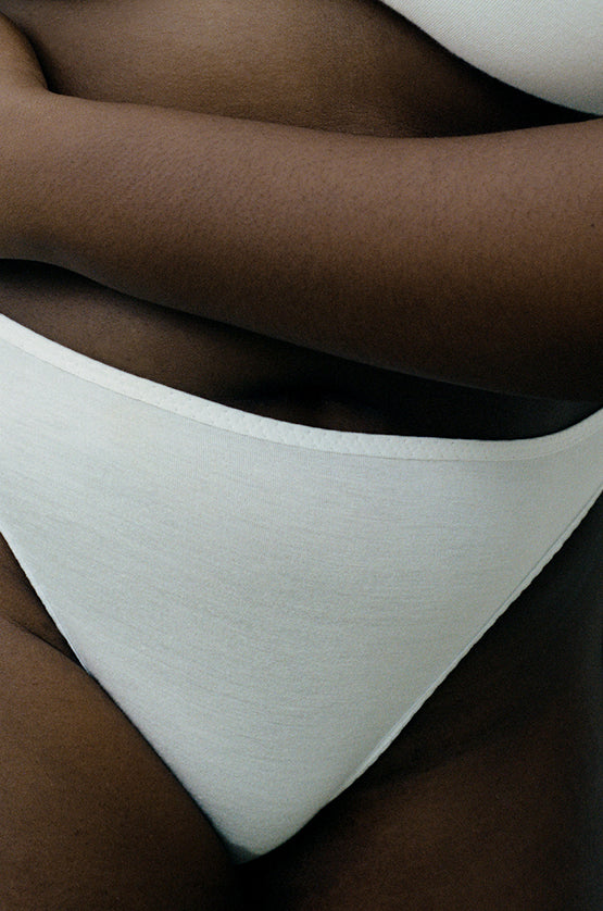 Close-up view of Kye Recline Brief bamboo French cut briefs in white. The soft bamboo fabric and high-cut design ensure a comfortable and eco-friendly fit by Kye Intimates.