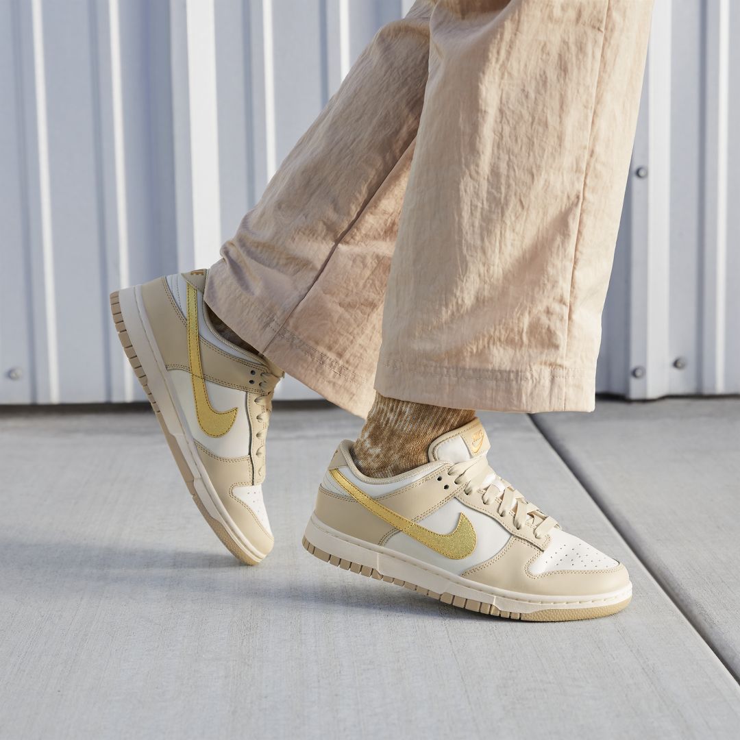 nike dunks gold swoosh