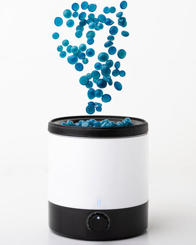 Blue wax beads in Parissa Mini Pro Wax Warmer