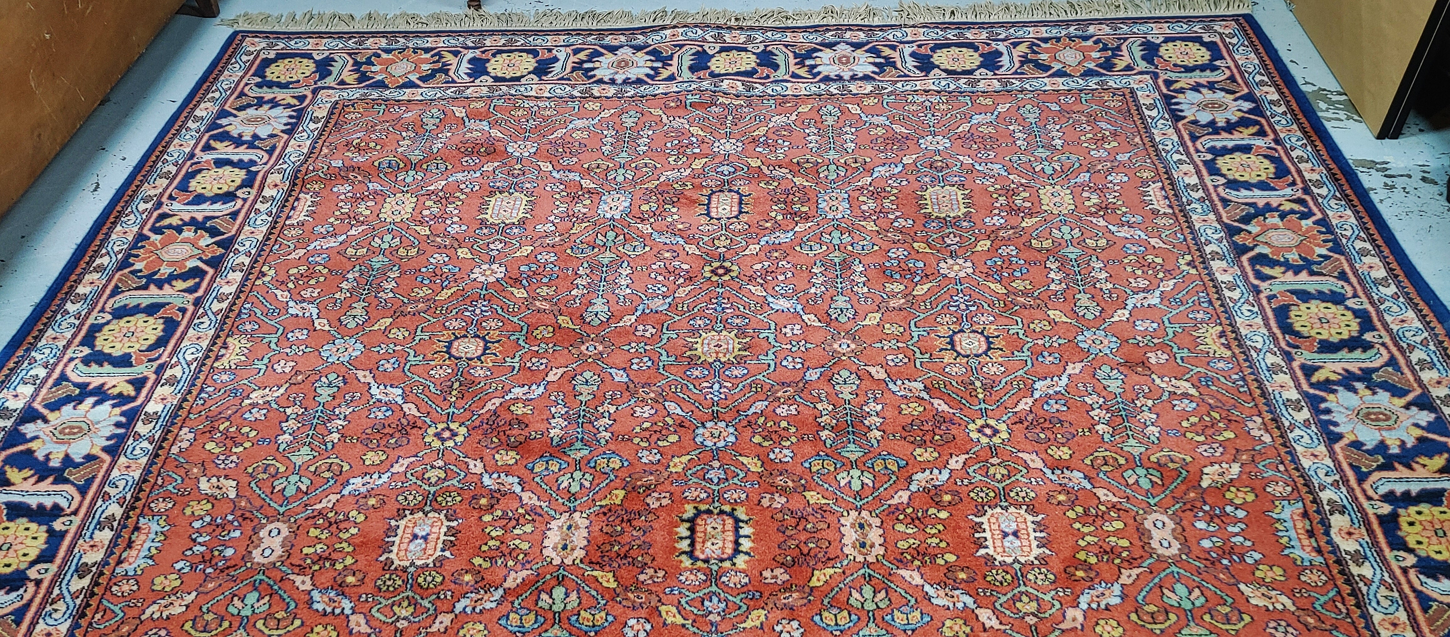 Oriental Area Rug in Salmon and Navy Colors by KARASTAN