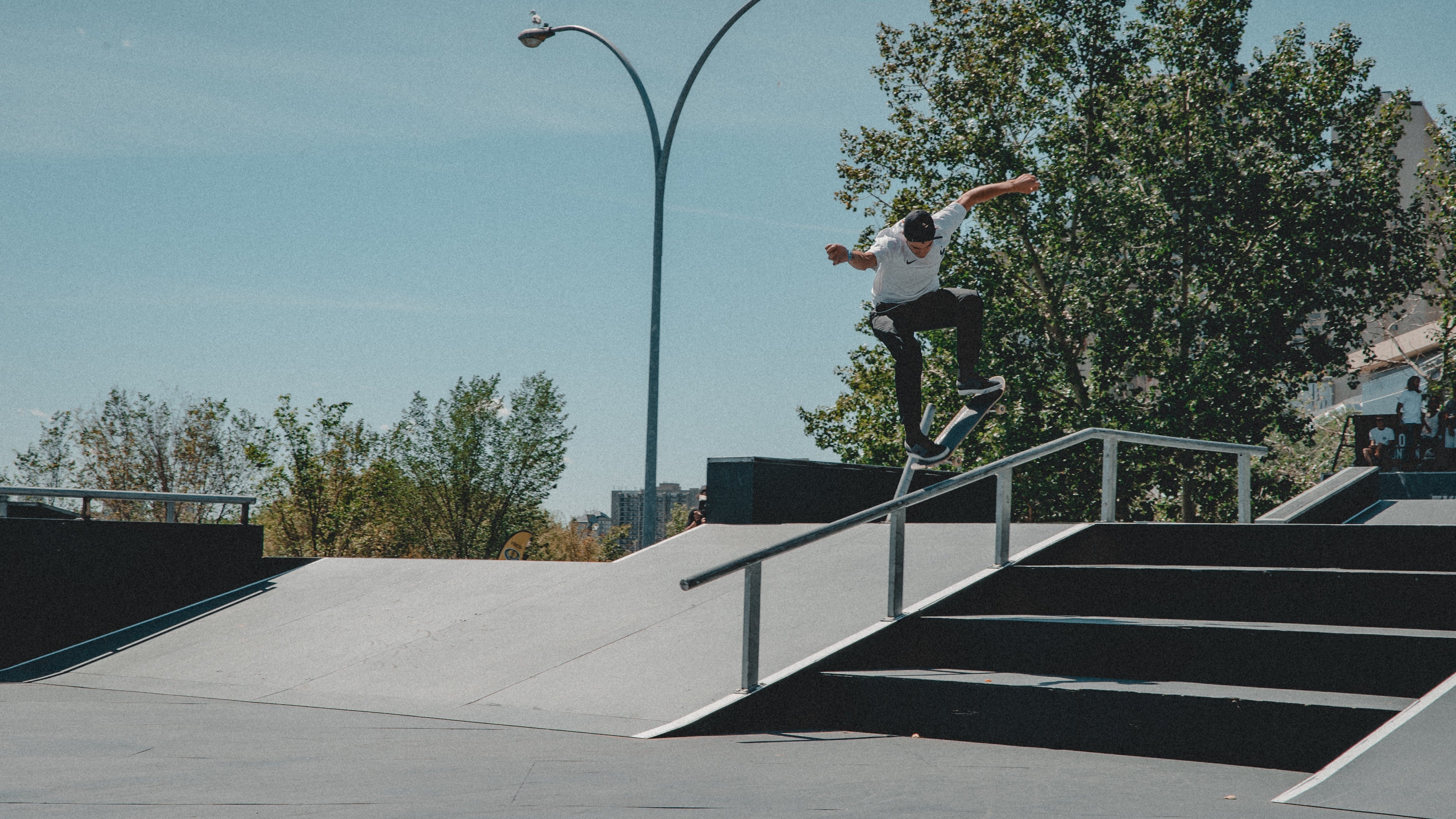 Skater Grinding Big Rail