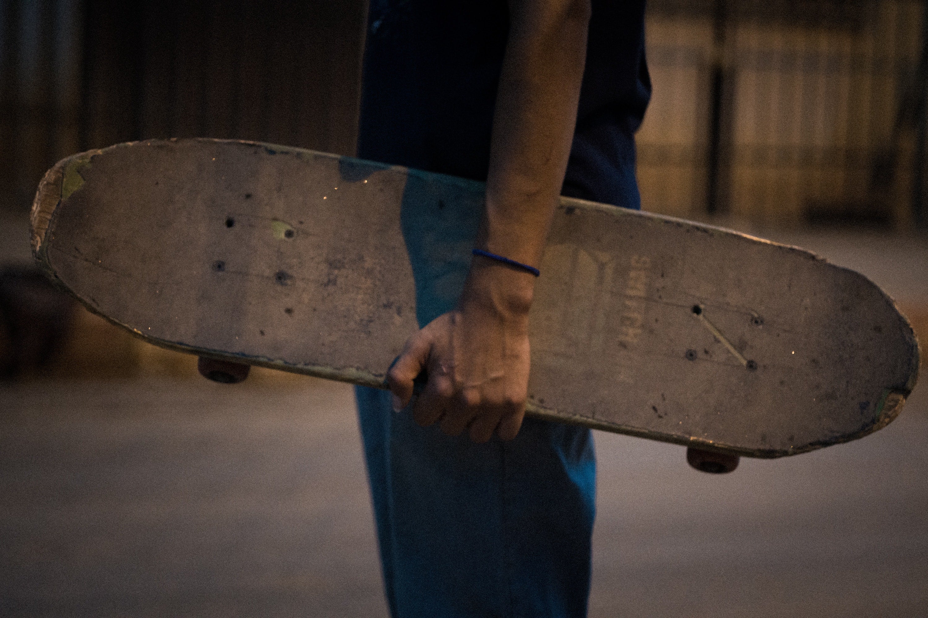 Skater Holding Board