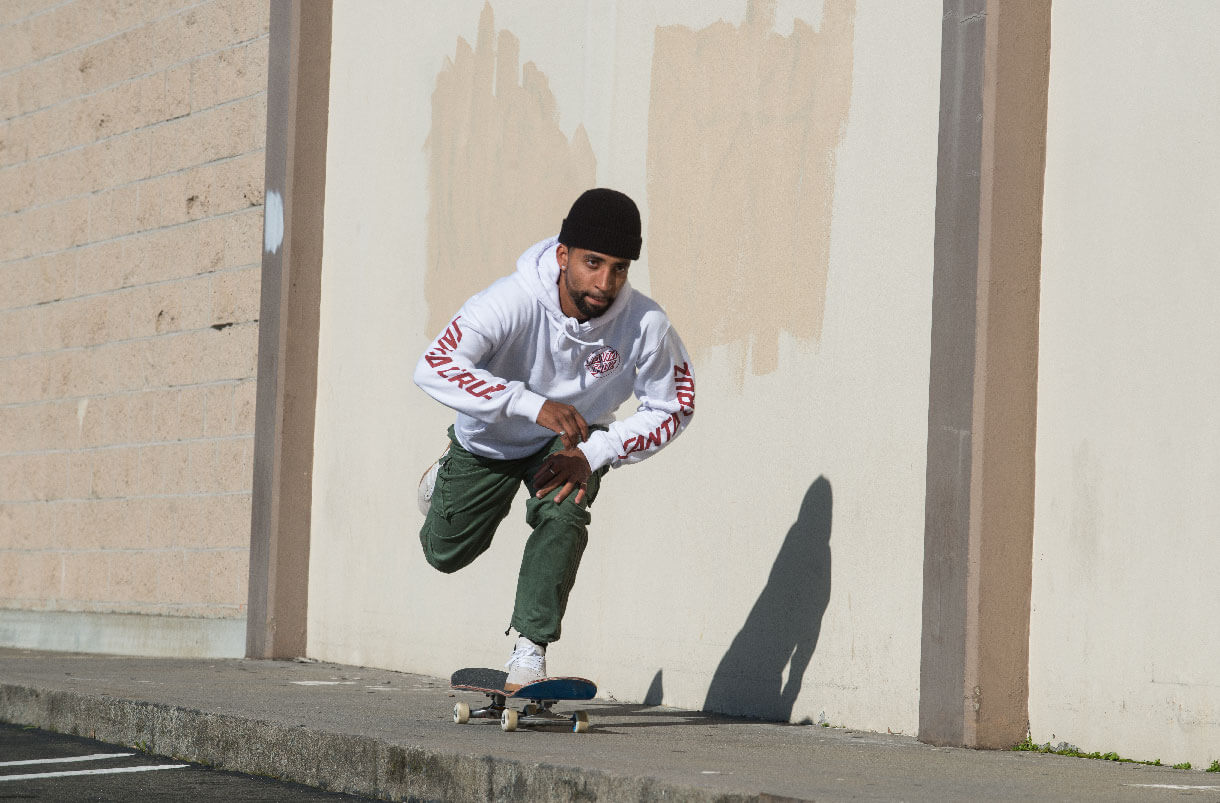 Skateboarder with Santa Cruz Sweater